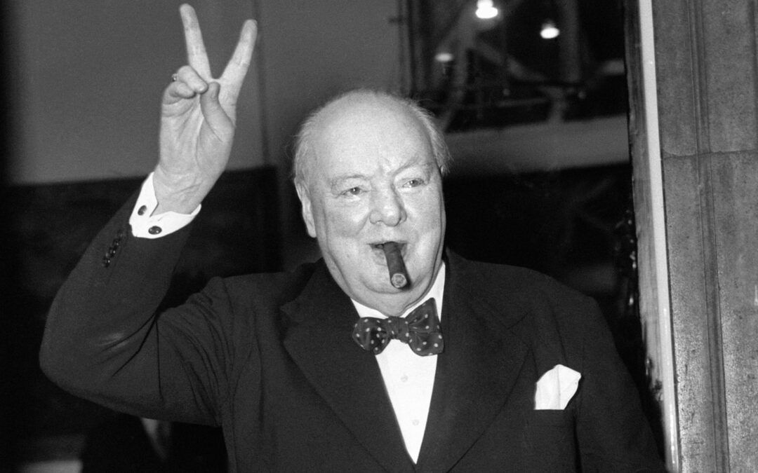 Famous photo of Winston Churchill giving the V for Victory sign.